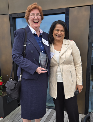Left to right: Kathleen McManus, KC (recipient) and Abha Romkey, Current Branch President (presenter)